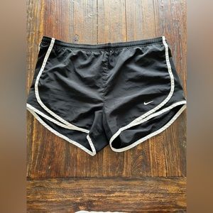Woman’s black and white Nike shorts